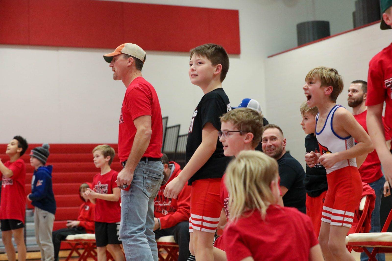 Coach Christensen cheering on the bench